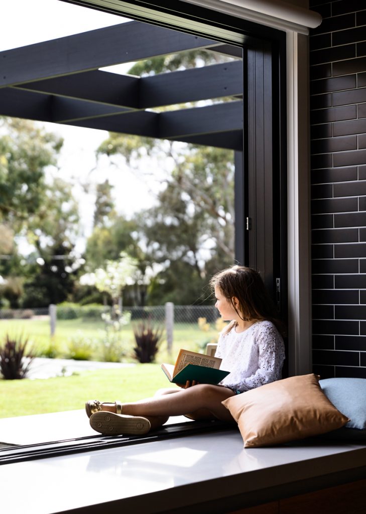 FlindersHouse_girlinwindowweb