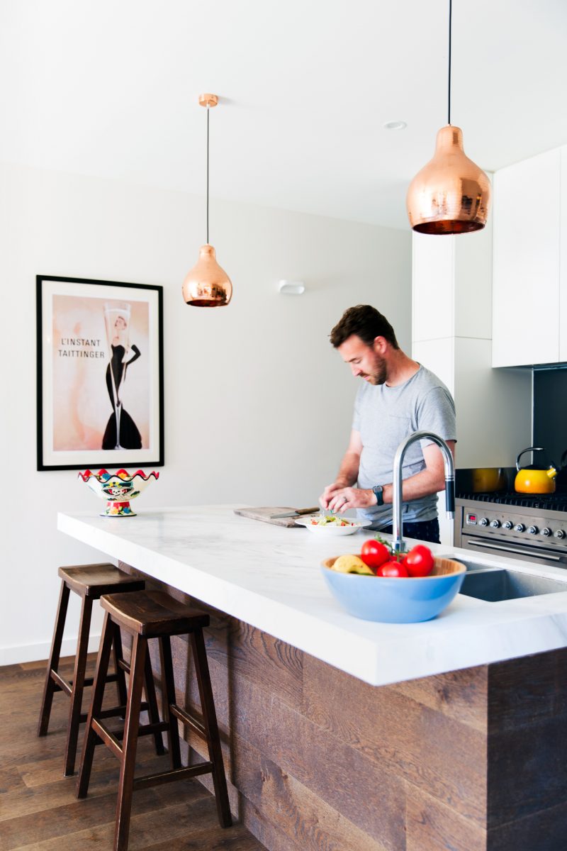 archiblox collingwood house interior kitchen man preparing food